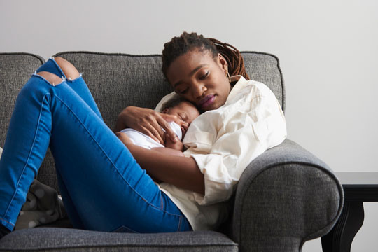 mother hugging child